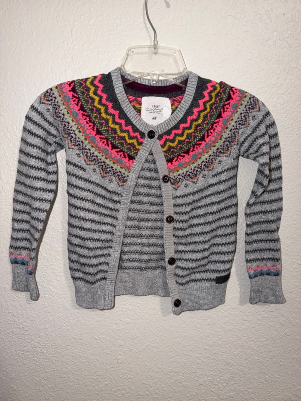 H&M girls' gray cardigan sweater featuring a colorful Fair Isle knit